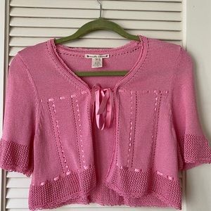 Pink ribbon-tie shrug